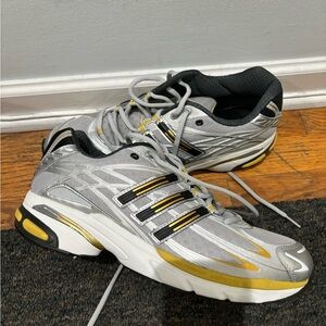 Brand New and never worn Adidas sneakers size 10.5